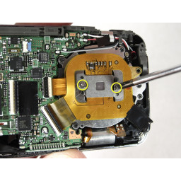 Как получить доступ к застрявшему объективу Nikon Coolpix S210